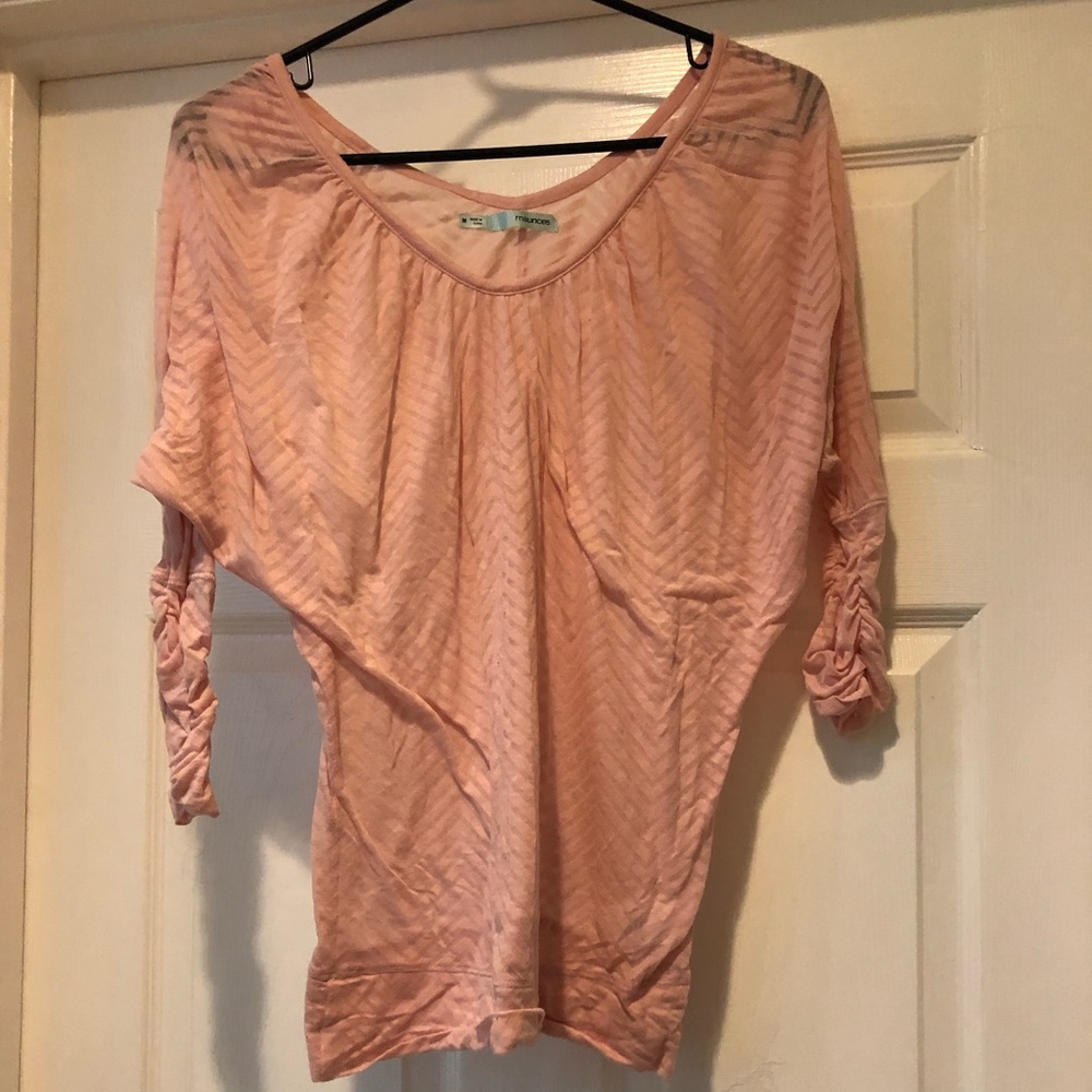 Sheer, pink quarter sleeved shirt.